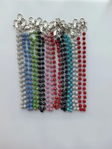 Detailed view of 12mm rhinestone clay bead chains in various colors for pants and bags