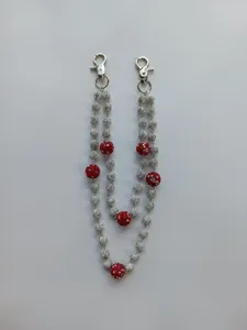 Detail view of sparkly 12mm rhinestone beaded chain with silver lobster clasps