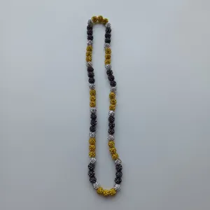 Rhinestone clay ball beaded necklace detail showing mixed gold and silver sparkling sphere beads.