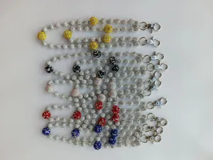 Detail view of multicolored 12mm rhinestone disco bead pant chains