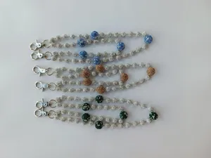 Detailed view of colorful 12mm pave rhinestone disco ball hip hop pants chains for jeans