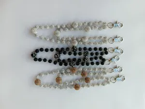 Detail view of 12mm rhinestone pave disco ball bead chains with silver clasps