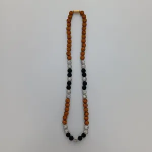 Detailed view of the multi-color Shamballa clay rhinestone beaded necklace with clasp.