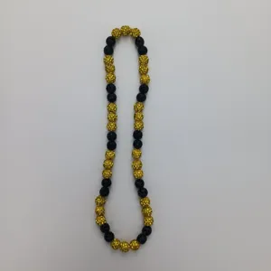Black and gold rhinestone Shamballa bead necklace detail shot, elastic hip hop style jewelry.