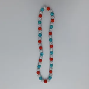 Detail shot of the red, white and blue crystal rhinestone pave Shamballa bead necklace.