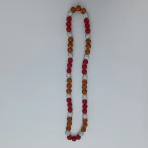 Detailed view of colorful rhinestone disco ball beaded necklace, close-up fashion jewelry accessory.