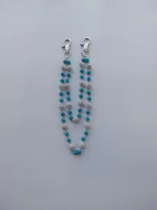 Macro view of 12mm turquoise and silver rhinestone clay ball chain with silver metal lobster clasps