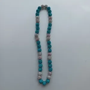 Shamballa rhinestone clay bead necklace detail view showing colorful sparkling ball elements.
