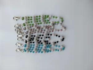 Detailed view of 12mm rhinestone disco ball hip-hop pants chains in assorted colors.