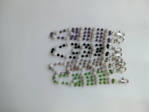 Detail showing 12mm pave clay disco ball waist chains in various vibrant colors.