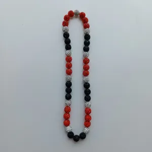 Red black silver rhinestone ball beaded necklace detail close up view fashion jewelry