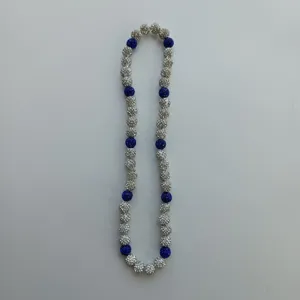 Detail view of shimmering Shamballa rhinestone beaded necklace, sparkling crystal balls.
