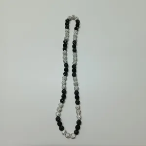 Detailed close-up view of the black and white rhinestone Shamballa crystal ball bead necklace.