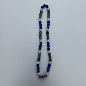 Detail view of Shamballa rhinestone beaded necklace in blue and silver color tones.