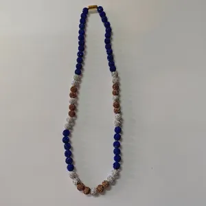 Detail view of colorful crystal rhinestone clay ball beaded shamballa necklace, chic jewelry piece.