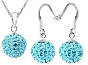 Exquisite light blue crystal pave ball necklace and earring set, sparkling jewelry details.