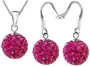 Detailed shot of sparkling magenta crystal pave ball necklace and matching earrings set design.