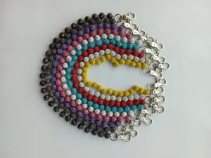 Detailed display of colorful 10mm rhinestone shamballa beads waist and pants chains.