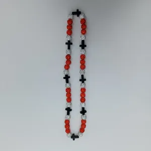 Detailed view of the rhinestone beaded cross necklace, streetwear hip hop style crystal jewelry.