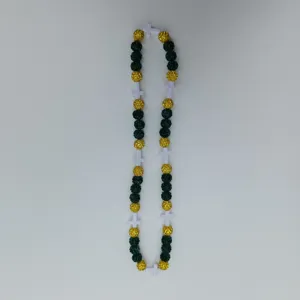 Green gold disco ball bead necklace detail shot showing glittering shamballa beads and crosses.