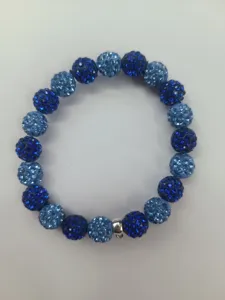 Detailed close-up view of blue crystal disco ball shamballa beaded bracelet detail