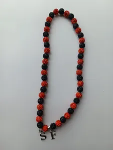 Handmade 12mm orange and black rhinestone clay bead Shamballa necklace with SF charms
