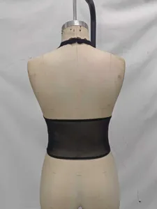 Black lace halter sheer corset top back view, showcasing boning details and floral lace.