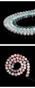 Detailed macro shot of natural stone round beads in various patterns and colors