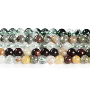 Natural phantom quartz round beads in mixed colors for DIY jewelry making on white background.