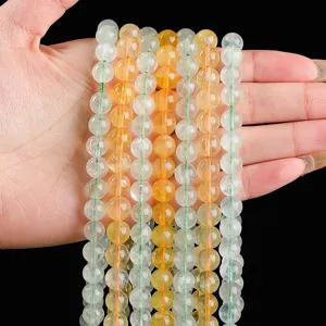 Perle rotonde in fluorite gialla naturale per la creazione di gioielli fai da te e hobby.