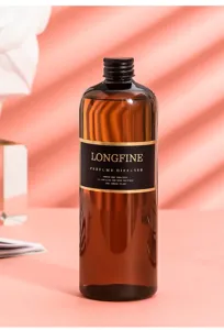 Recharge d'huile essentielle 500ml pour diffuseur, elegante bouteille en verre brun.