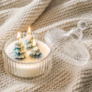 Christmas tree scented candle in ribbed glass jar with lid for romantic holiday decor gift.