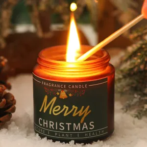 Christmas scented candle gift set, amber glass jar with festive label detail display