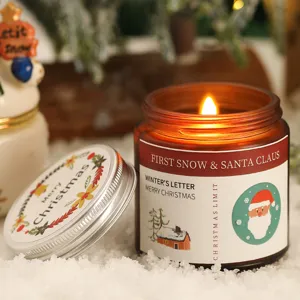 Christmas scented candle jar in amber glass with winter holiday gift decoration design.