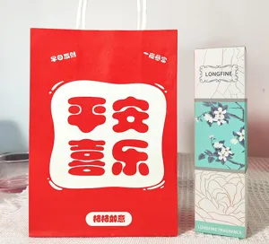 Detailed view of the red New Year festive gift bag and floral aromatherapy box set.
