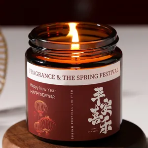 New Year limited scented candle in amber glass jar for home festive decor and gifts.