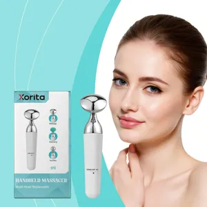 Masseur facial portable avec têtes interchangeables pour les soins de la peau et la beauté.
