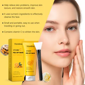 Vue detaillee montrant le tube de masque peel off au curcuma vitamine c et le pinceau.