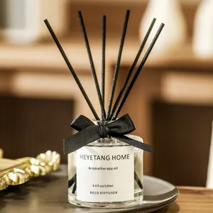 Diffuseur de parfum noir avec noeud ruban et batonnets en fibre pour decoration interieure