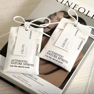 Minimalist fabric wardrobe sachet bag with plant particles for fresh and long-lasting air.