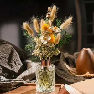 Set de difusor de varillas con flores secas decorativas y frasco de vidrio para el hogar.