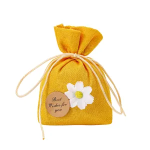 Yellow burlap sachet bag with white daisy flower and tag, perfect for home wardrobe and car.