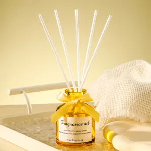 Luxus Heimduft ätherisches Öl Reed Diffusor Set mit eleganter bernsteinfarbener Glasflasche