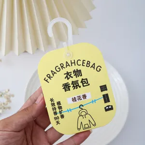 Hanging wardrobe scent sachet with plastic hook, Osmanthus fragrance, long-lasting plant aroma.