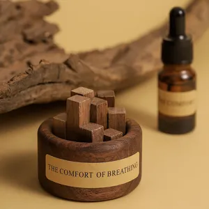 Wooden aromatherapy diffuser set with small wood sticks and holder for home and car use.