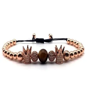 Exquisite rose gold crown tiger eye stone beaded bracelet with cubic zirconia charms.
