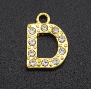 Gold-tone letter D pendant charm featuring sparkling rhinestones and metal details.