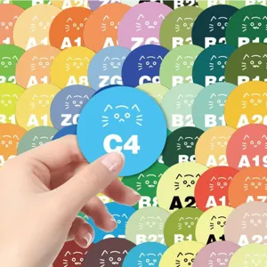Detailed view of colorful round pixel cat color card stickers with clear code numbers for crafts.