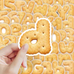 Close-up detail shot of a creative Korean ins-style biscuit letter d sticker for journaling.