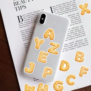 Clear transparent phone case with creative cookie letter stickers, stylish aesthetic design.